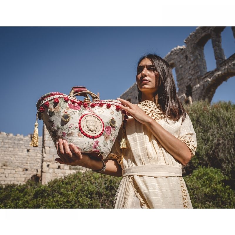 handwoven bag with red decoration
