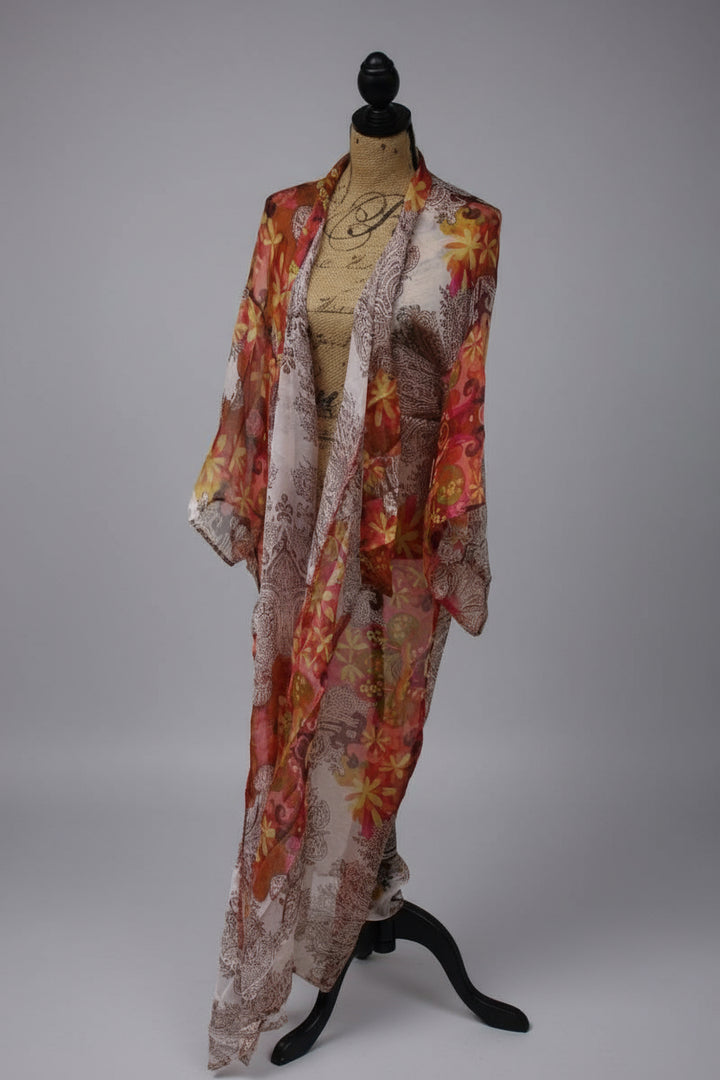 Floral kimono on a mannequin against a white wall