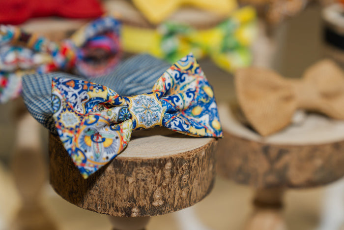 A Bowtie with Sicilian Folk Pattern on a block of wood
