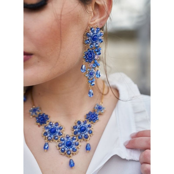 Blue Flowers Parure, on a beautiful Model, Earrings and Necklace, weaved with the Chiacchierino technique